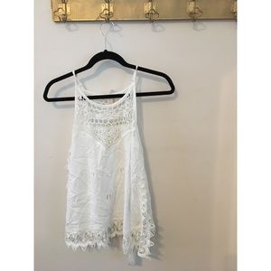 White tank with open sides.